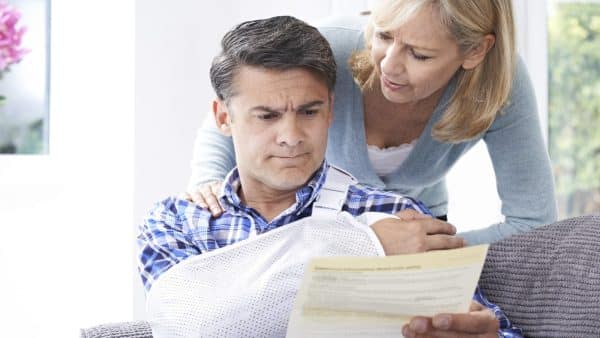 Husband With His Arm In A Cast Stock Photo