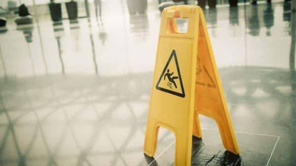 Caution Slippery Surface Sign Stock Photo